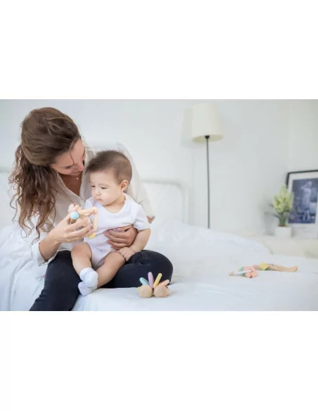 Grzechotka z dzwonkiem pastelowy trójkąt